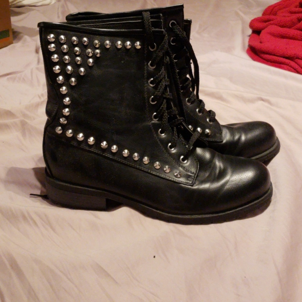 Black combat boots with spikes